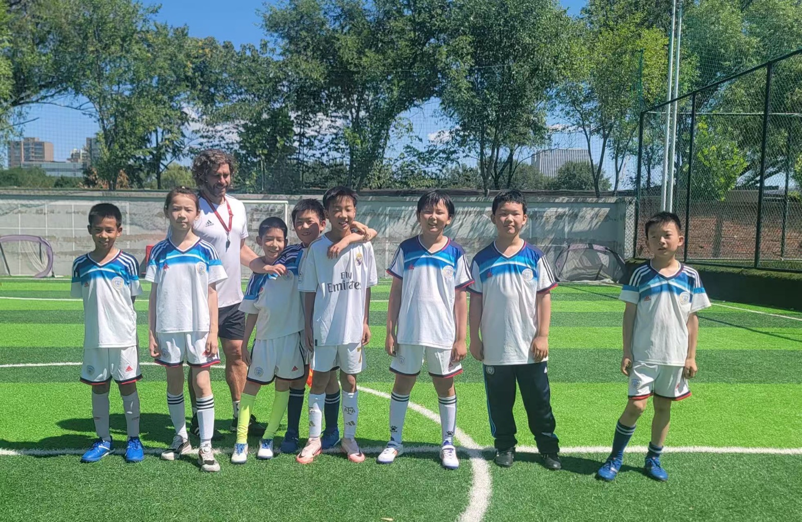 Alan Wang with his soccer team